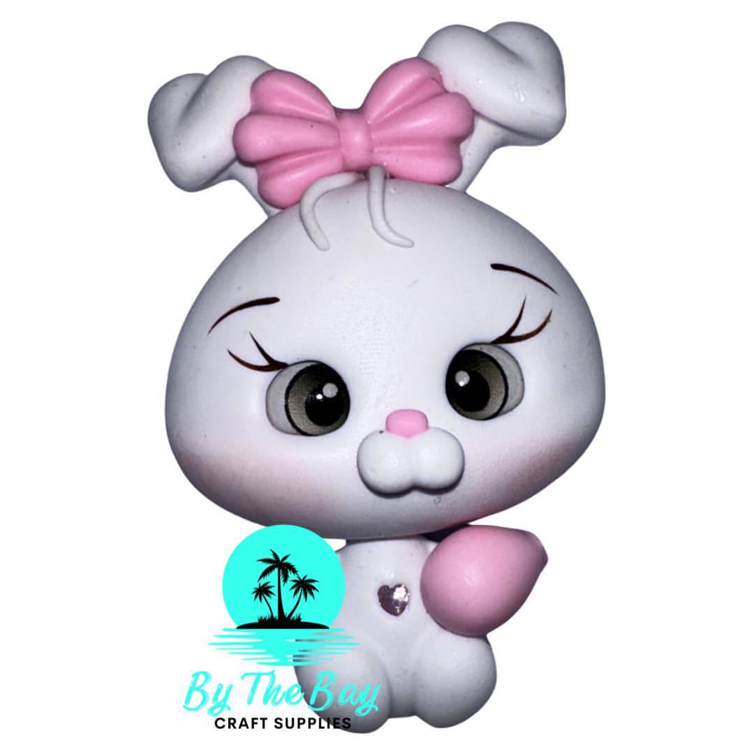 White bunny pink bow