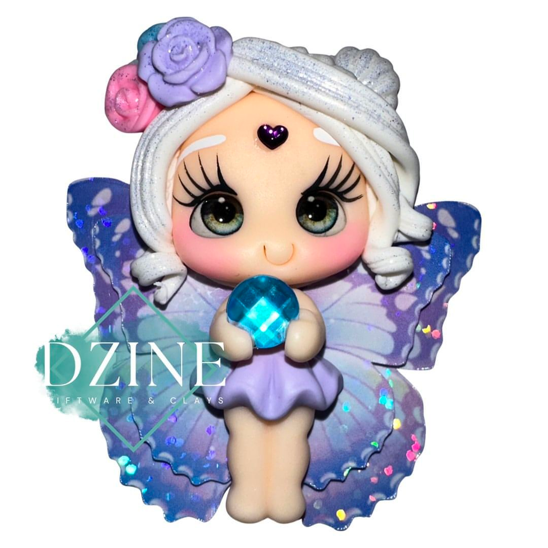 Fairy holding gem